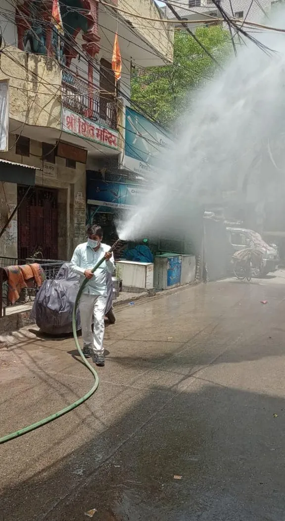 सनलाइट कॉलोनी I और सिद्धार्थ एक्सटेंशन पॉकेट C में सेनिटेशन अभियान — तस्वीर 11 में से 25