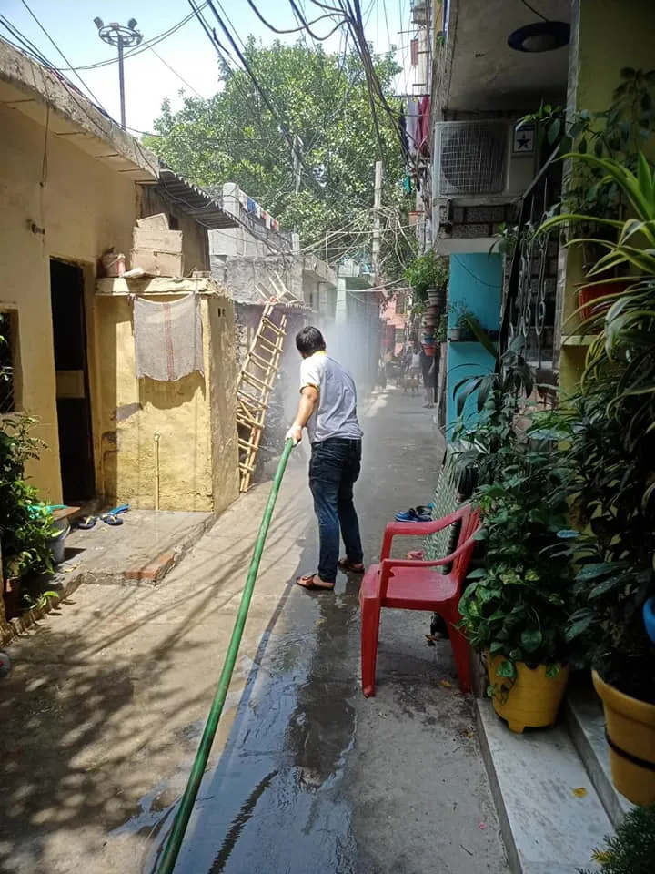 सनलाइट कॉलोनी I और सिद्धार्थ एक्सटेंशन पॉकेट C में सेनिटेशन अभियान — तस्वीर 18 में से 25