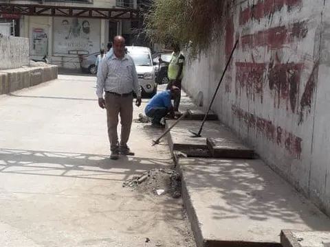 सिद्धार्थ नगर अंडरपास में नालियों की सफाई अभियान — 5